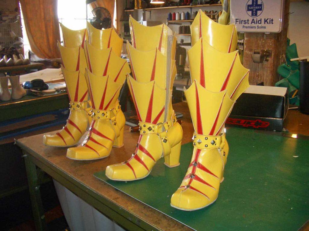 a pair of custom red and yellow boots