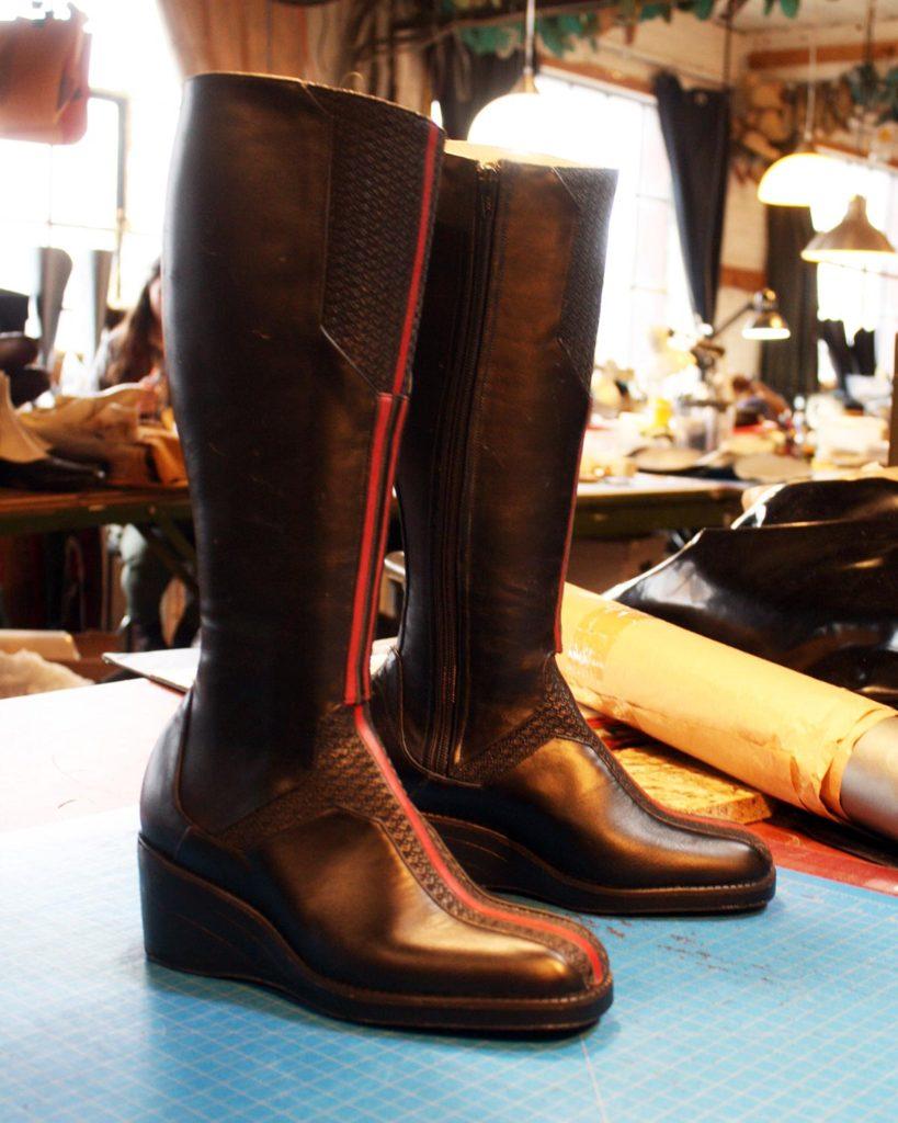 a pair of custom brown leather boots