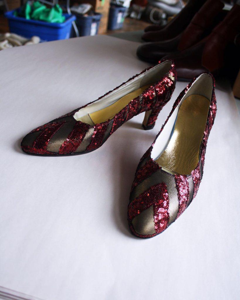 a pair of custom sequinned high heels