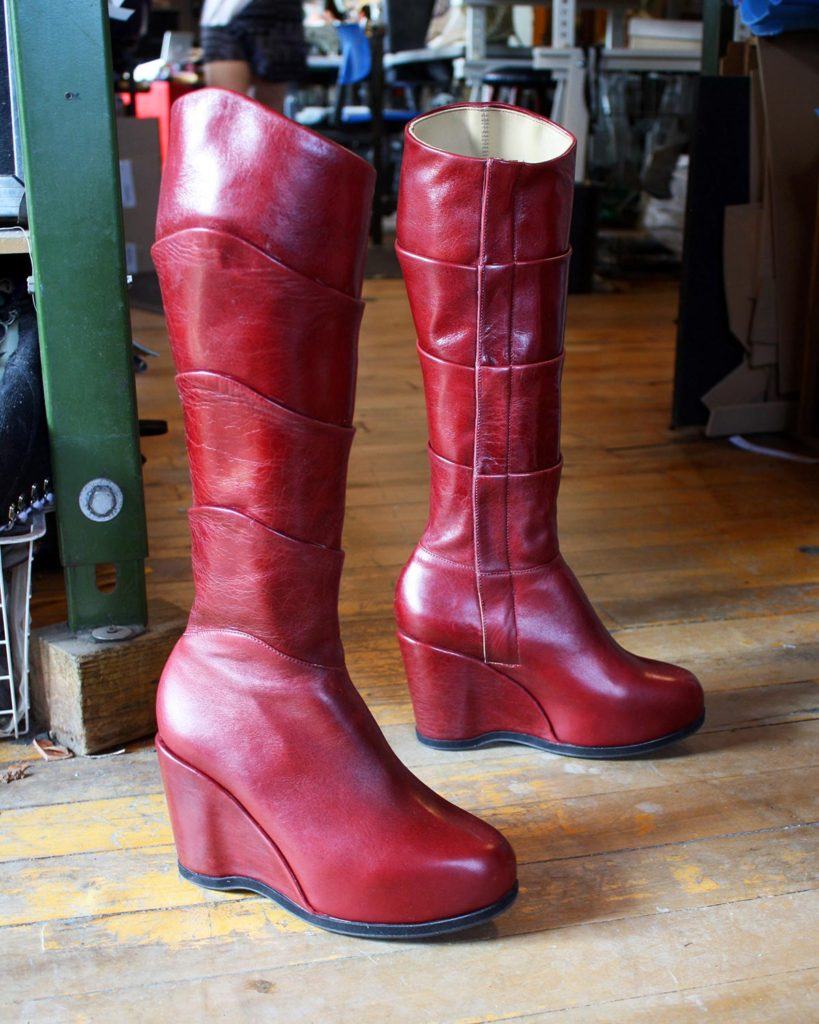 a pair of custom red leather boots