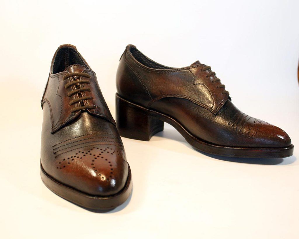 a pair of custom brown leather dress shoes