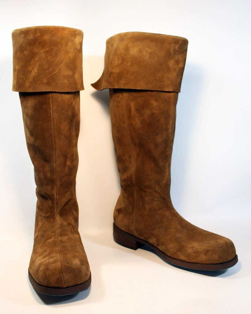 a pair of custom brown suede boots