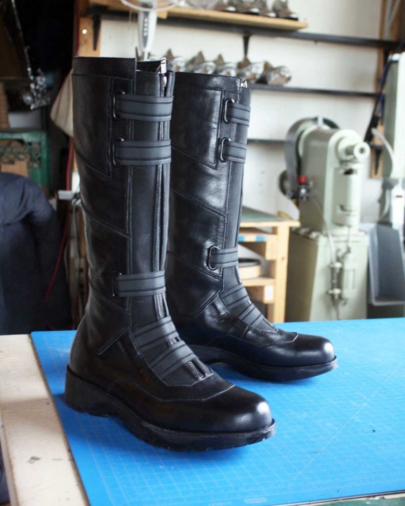 a pair of custom black leather boots