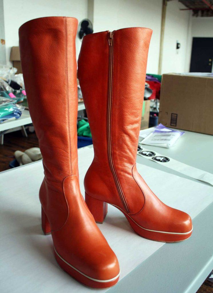a pair of custom high boots