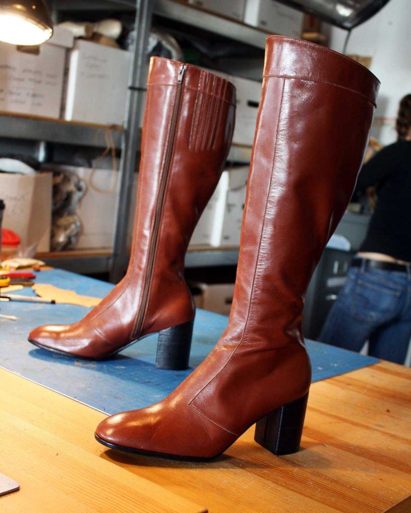 a pair of custom high heeled boots