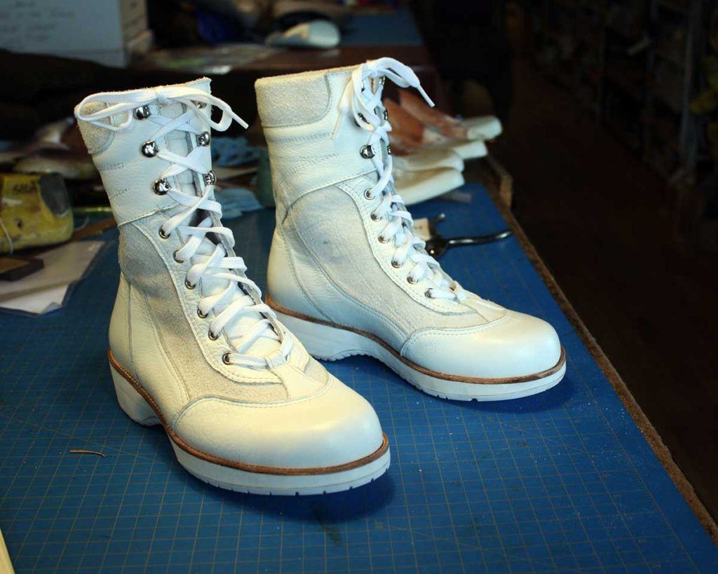a pair of custom high-top shoes