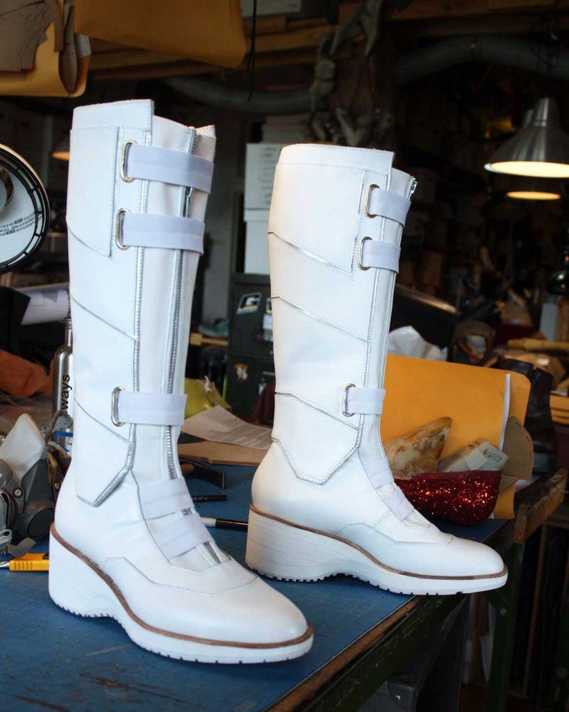 a pair of custom white boots