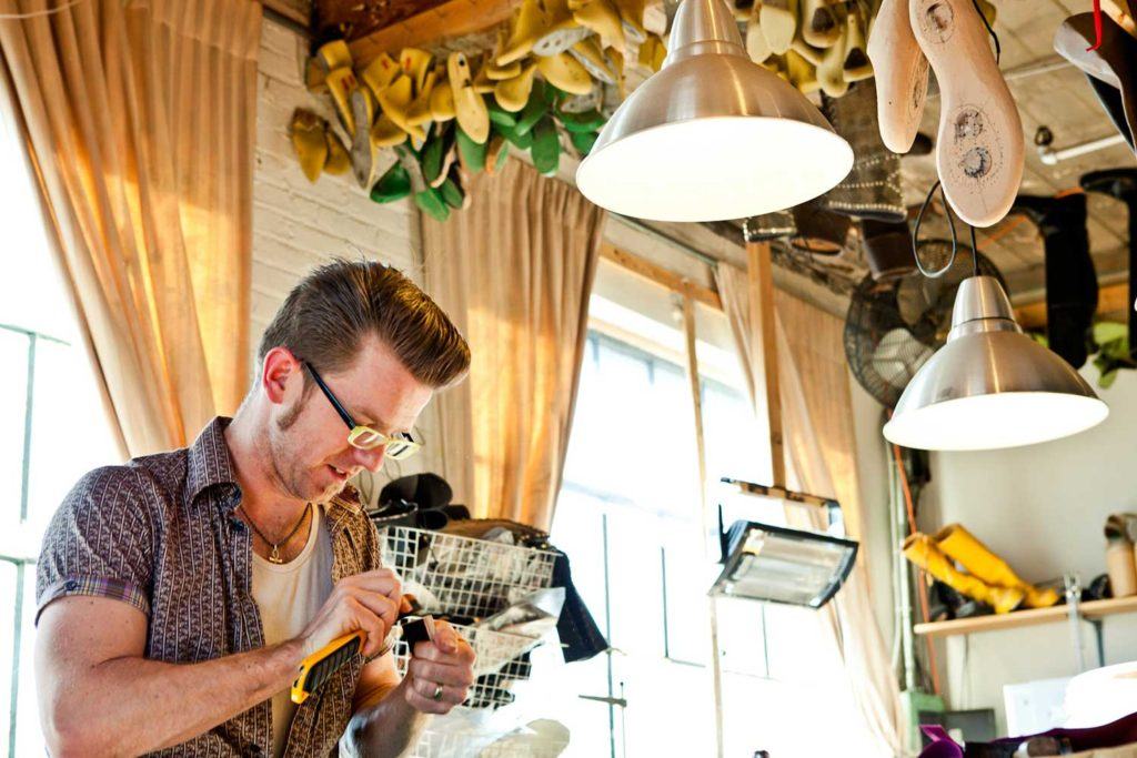 a man working on shoe design