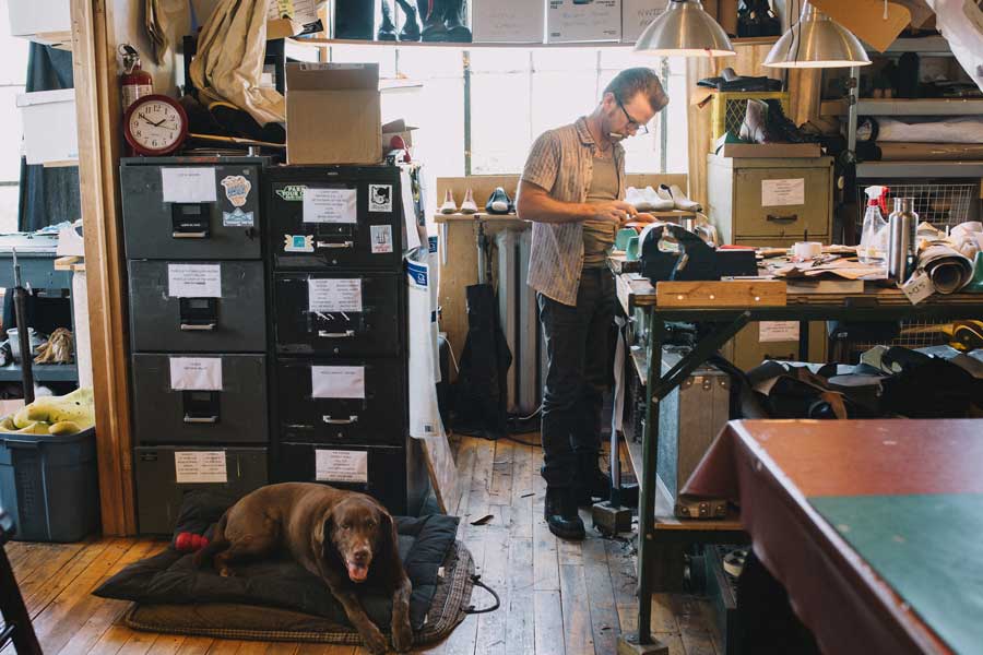 a man working in shoe warehouse