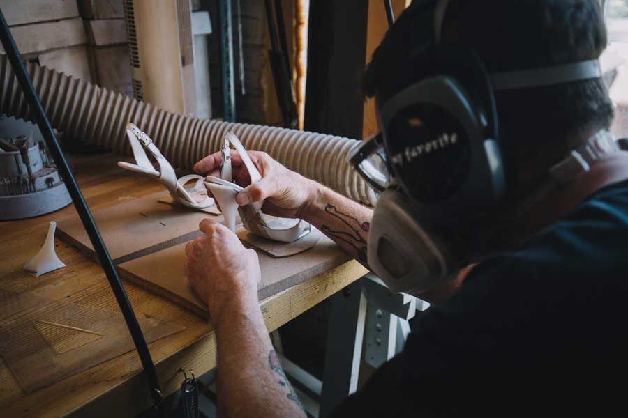 man working in shoe warehouse