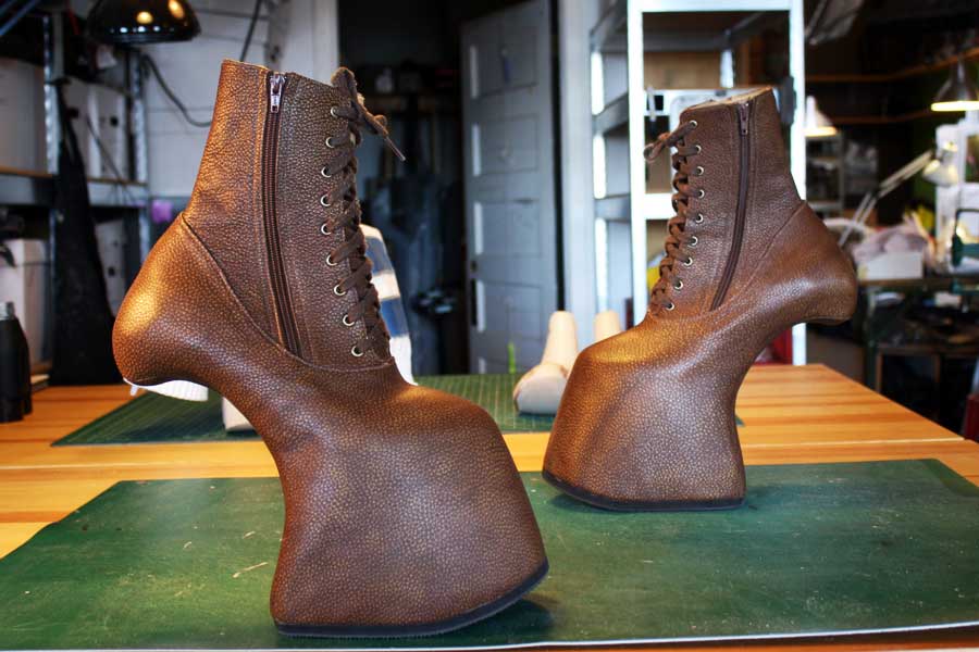 a pair of custom high-toed platform boots