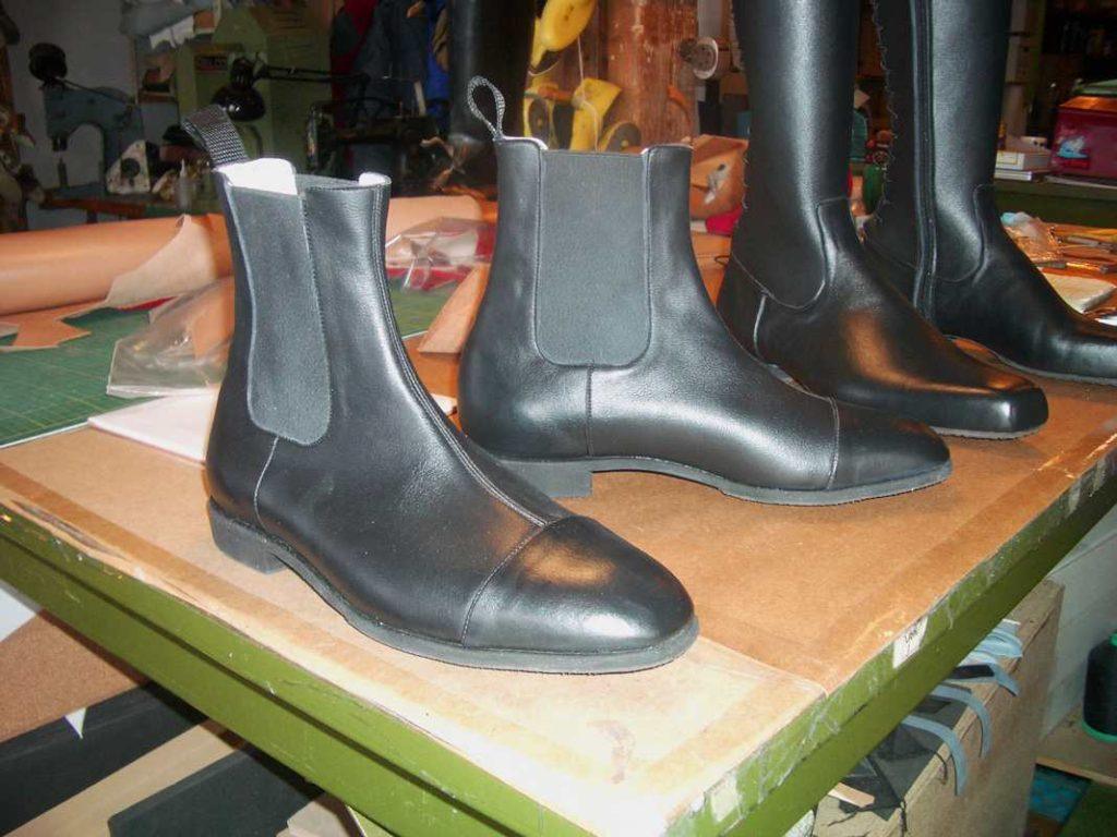 pair of grey ankle length boots