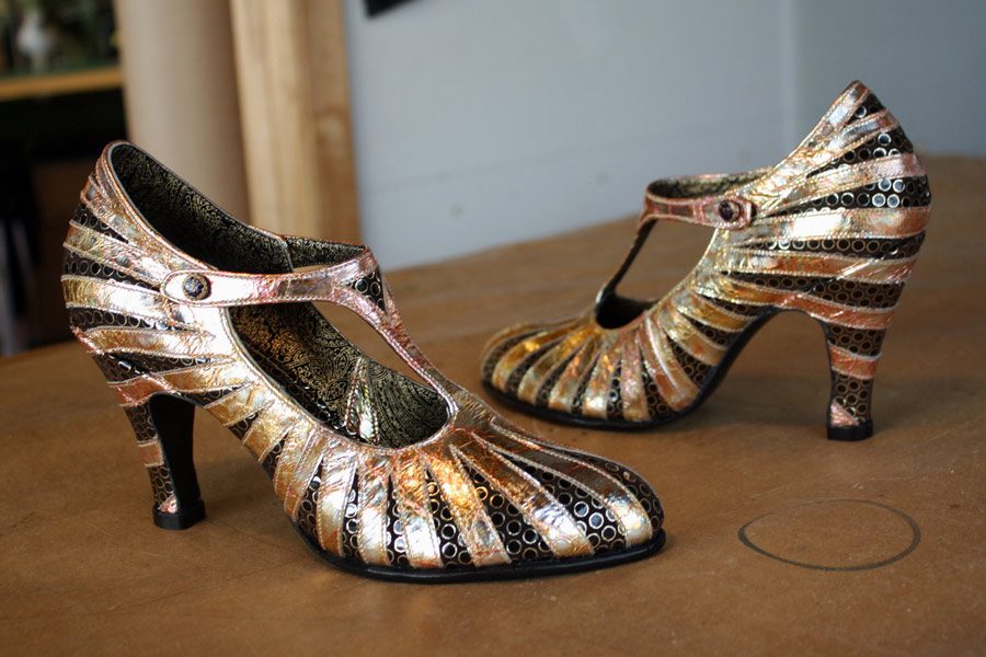 black and gold starburst heels