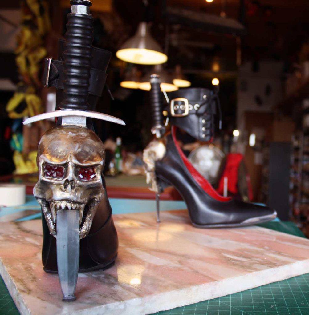 Skeleton face shoes with dagger as heel