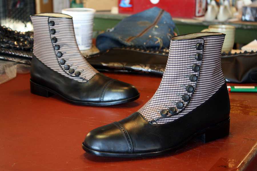 houndstooth patterned ankle boots with buttons