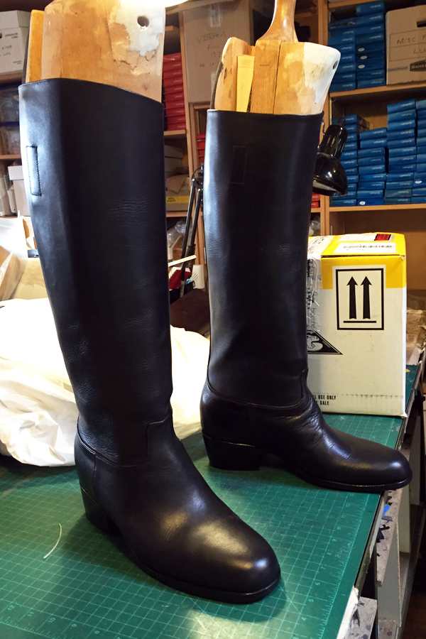 black knee length leather boots