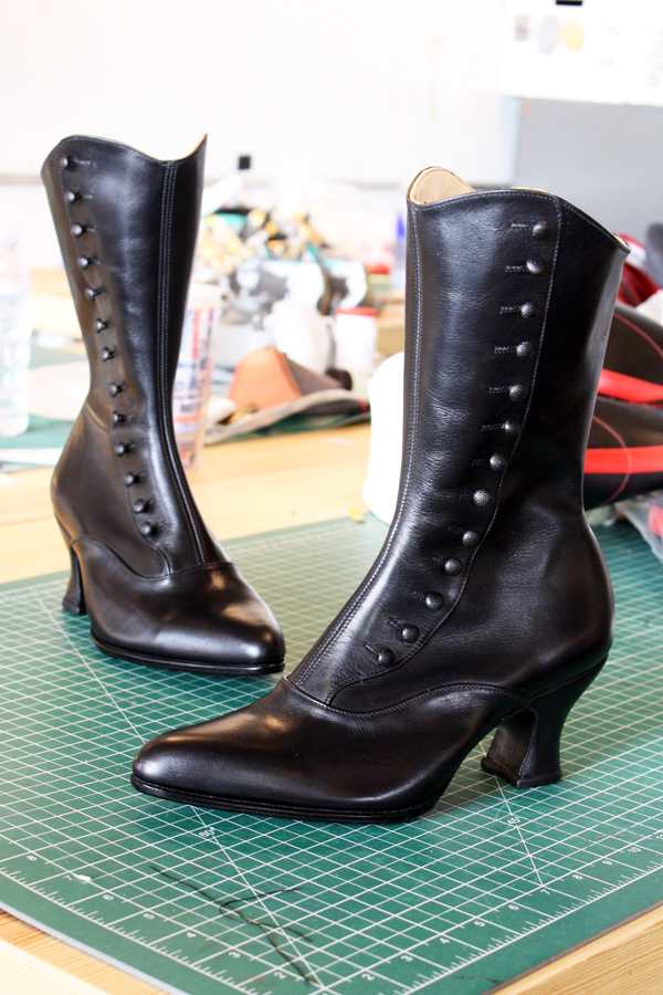 black buttoned ankle boots