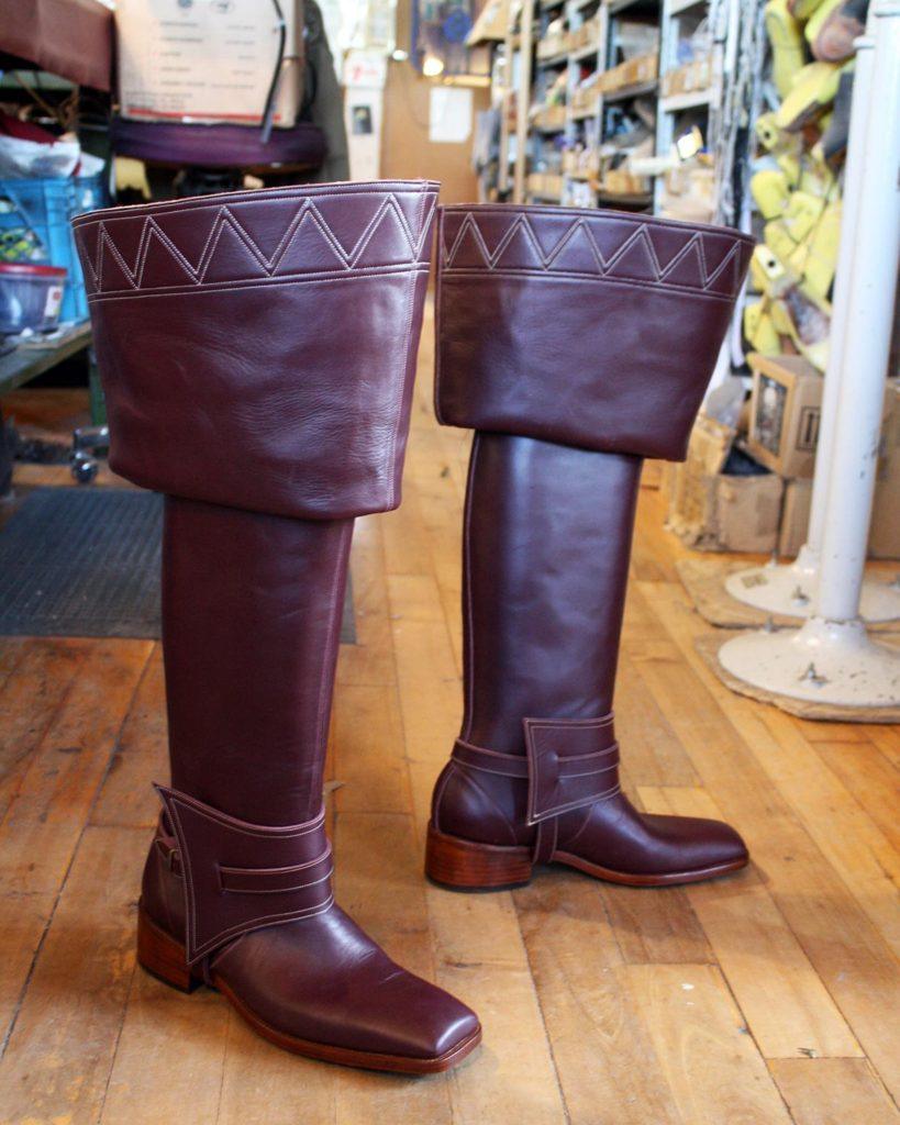 a paid of custom brown period theater boots