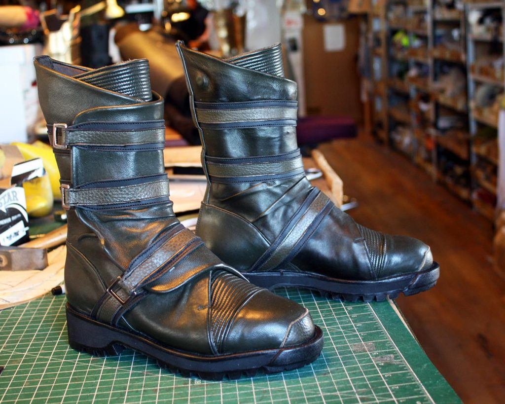 a pair of custom black boots