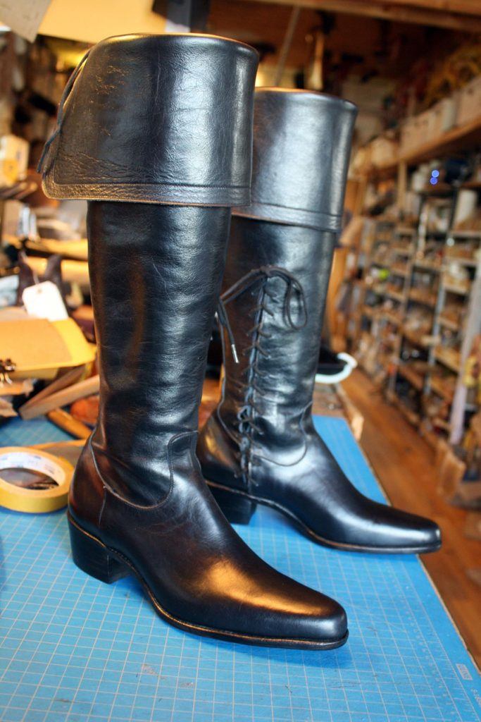 a pair of custom black period period boots for theatre