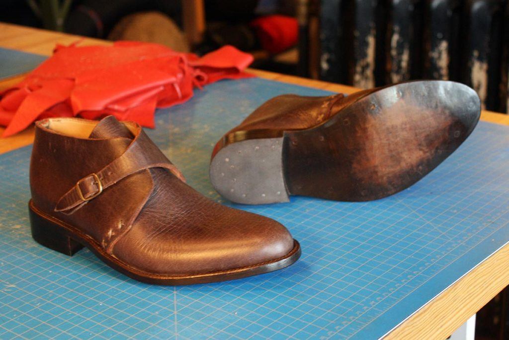 a pair of custom brown leather shoes