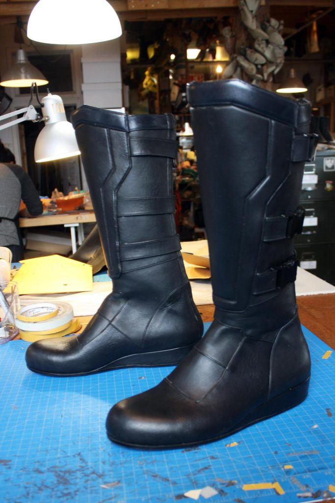 a pair of custom black boots