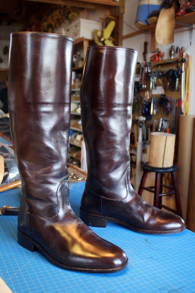 a pair of brown leather boots