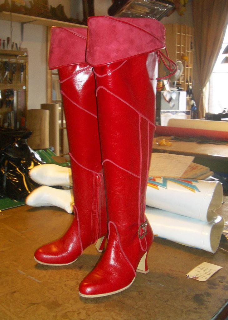 red thigh length boots