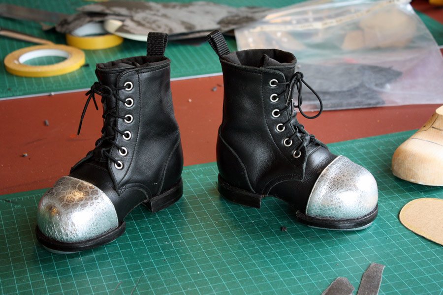 black ankle boots with silver toecaps