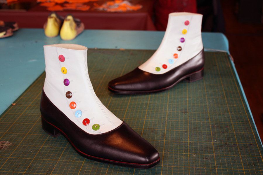 two-tone boots with coloured buttons