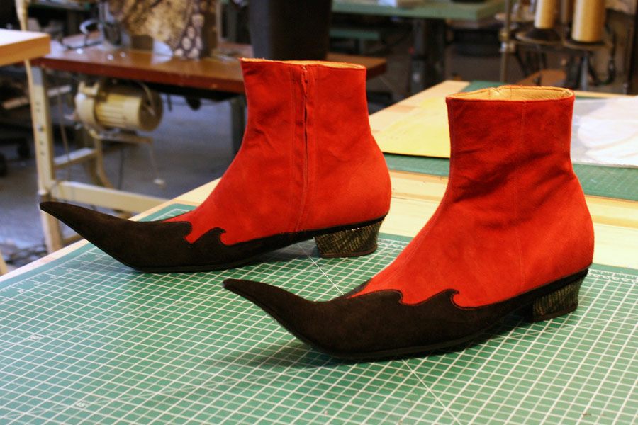 black and red theatrical shoes with sharp toes
