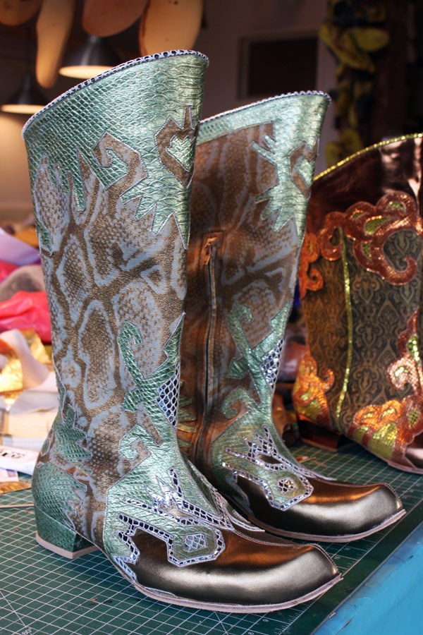 ornately engraved leather boots