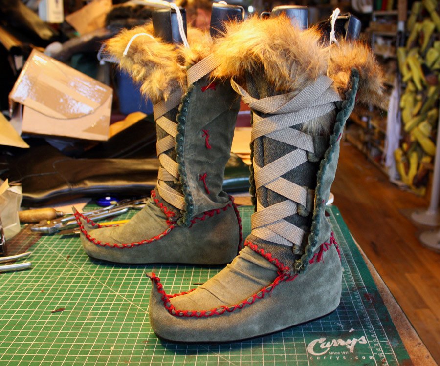 fur lined theatre boots with upturned toes